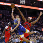 Curry's 35 points send Warriors past Raptors, 129-117