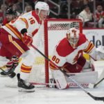 Domi scores in OT to lift Blackhawks over Flames 4-3
