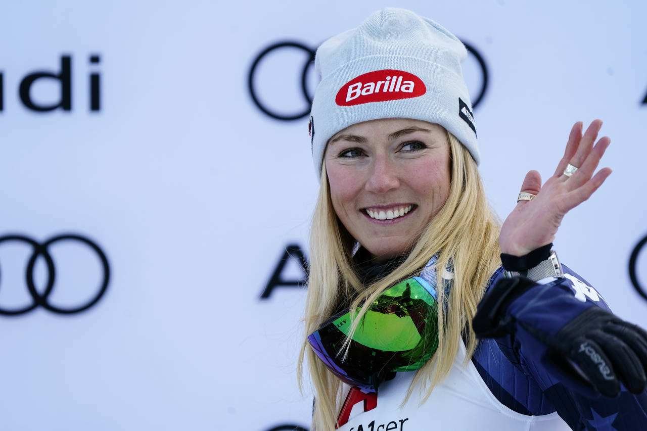 United States' Mikaela Shiffrin celebrates on the podium after winning an alpine ski, women's World...
