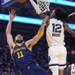 Poole beats buzzer with layup, lifts Warriors past Grizzlies
