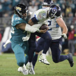 Jags return fumble for TD, beat Titans for AFC South title