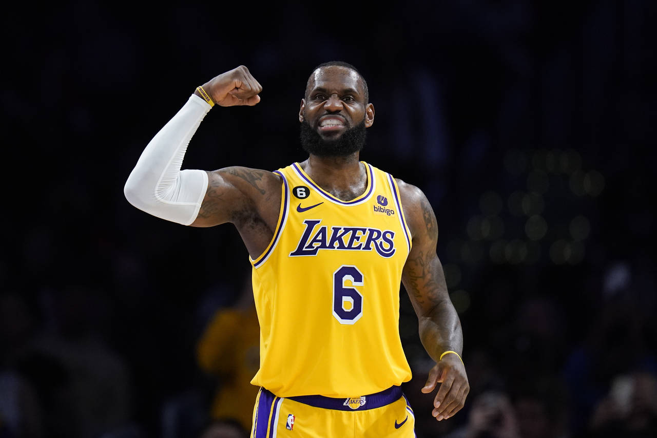 Los Angeles Lakers' LeBron James (6) flexes his arm during the second half of an NBA basketball gam...