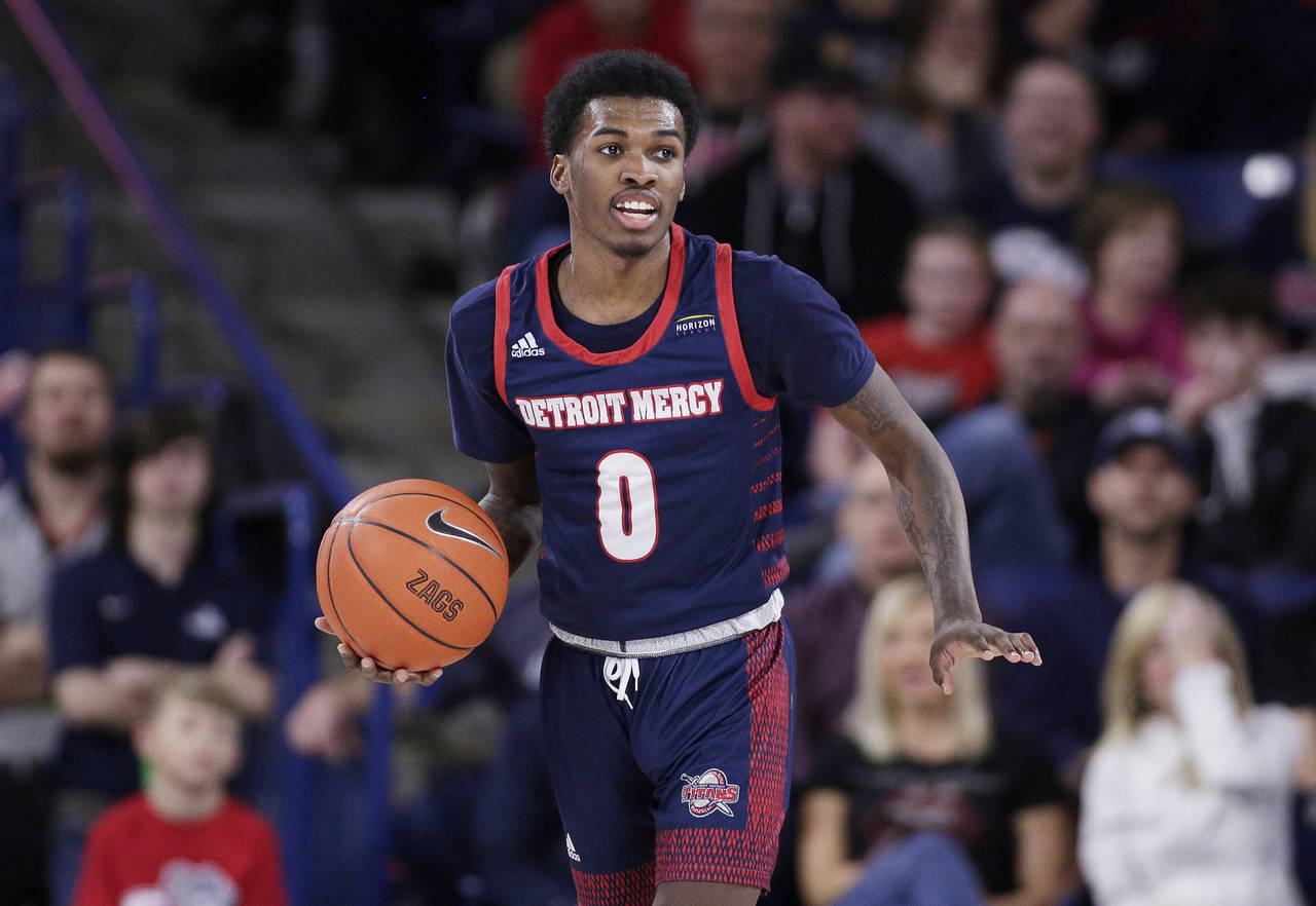 FILE - Detroit Mercy guard Antoine Davis brings the ball up during the second half of the team's NC...