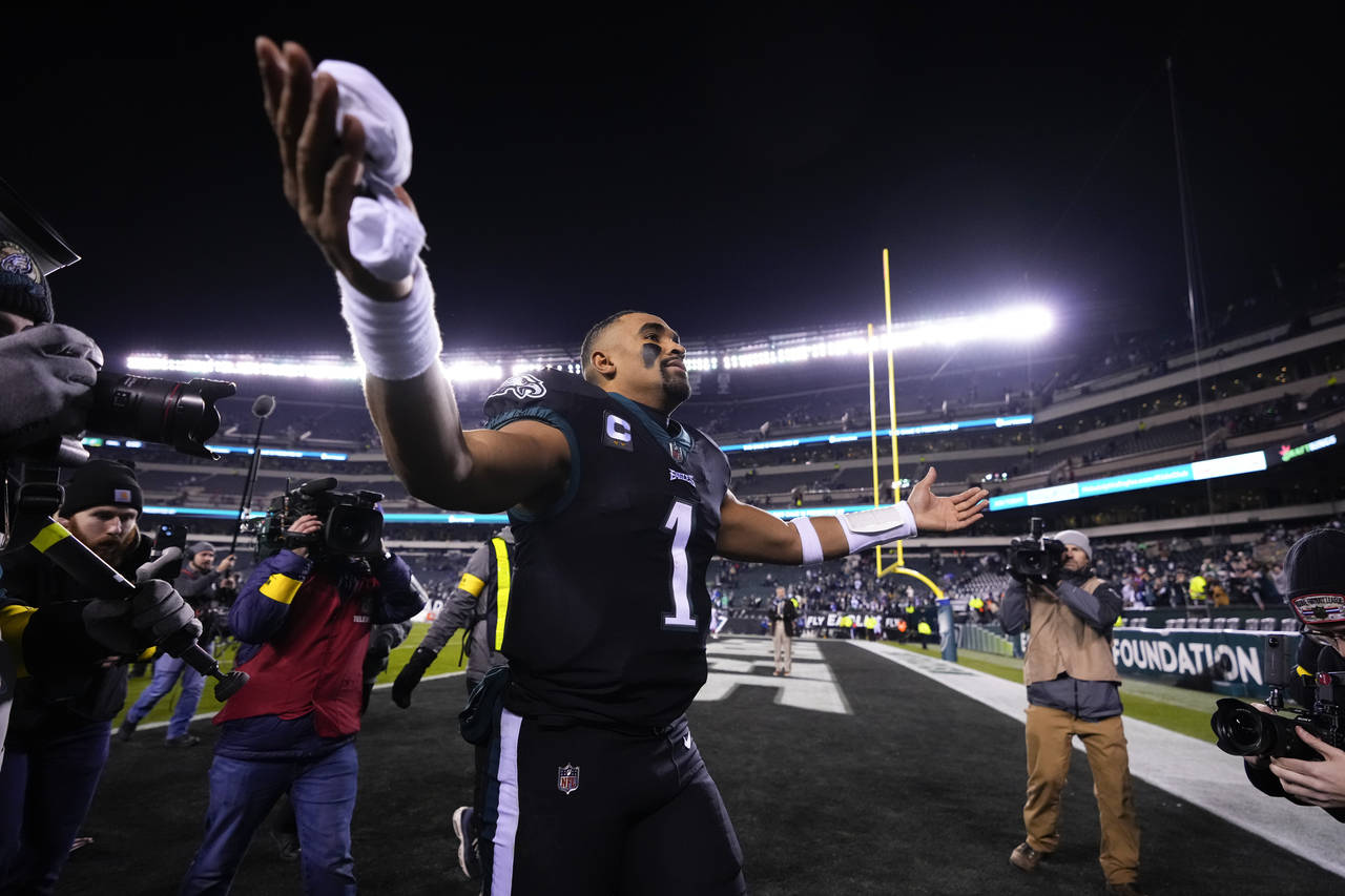 Philadelphia Eagles quarterback Jalen Hurts reacts following an NFL football game against the New Y...
