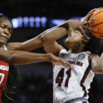 Boston's sets record, No. 1 Gamecocks top Arkansas 92-46
