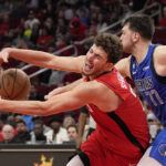 Doncic scores 39, Mavs rally for 111-106 over Houston