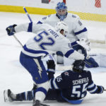 Connor's record 41st winner leads Jets past Lightning 4-2