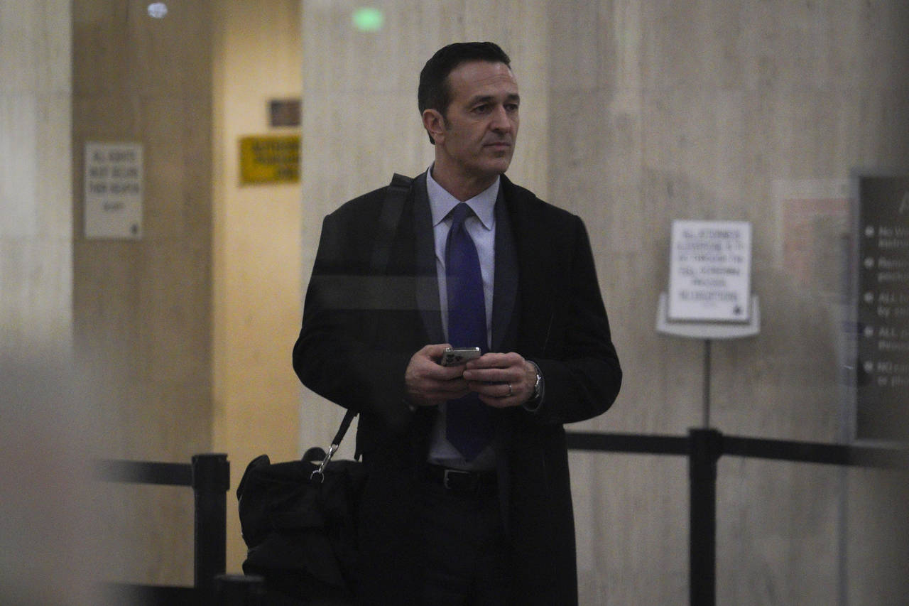 Former 21st Century Fox executive Hernan Lopez leaves Brooklyn's Federal court, Wednesday Jan. 18, ...