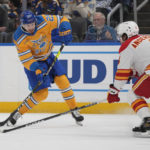 Thomas scores in OT, Blues rally past Flames 4-3