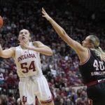 Holmes scores 22, No. 4 Indiana women outlast Nebraska in OT
