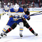 Lucchini scores 1st, Senators end Sabres' 6-game win streak