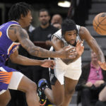 Paul, Bridges help Suns escape Spurs in overtime, 121-116
