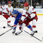 Rangers score 3 in 3rd to stop Hurricanes' win streak at 11