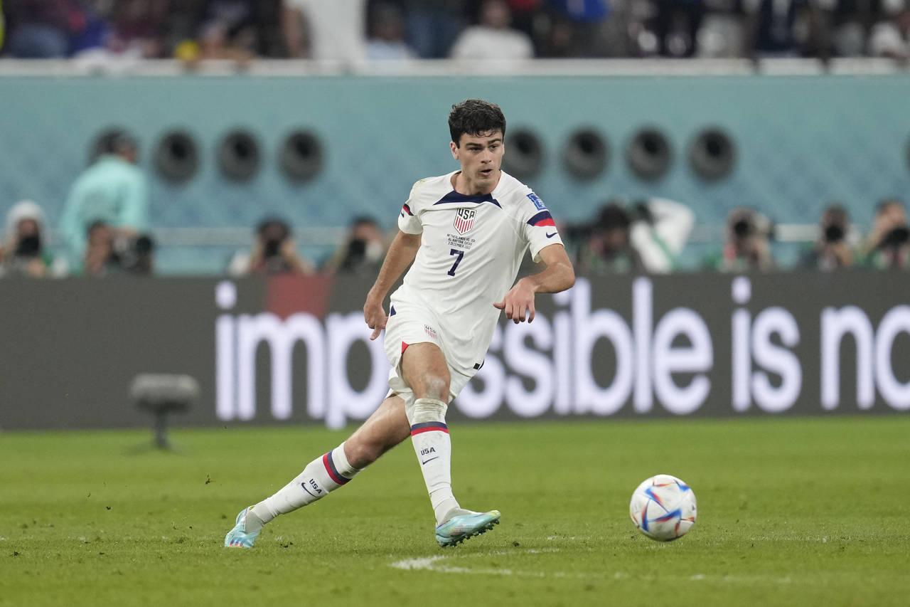 FILE - Gio Reyna of the United States kicks the ball during the World Cup round of 16 soccer match ...