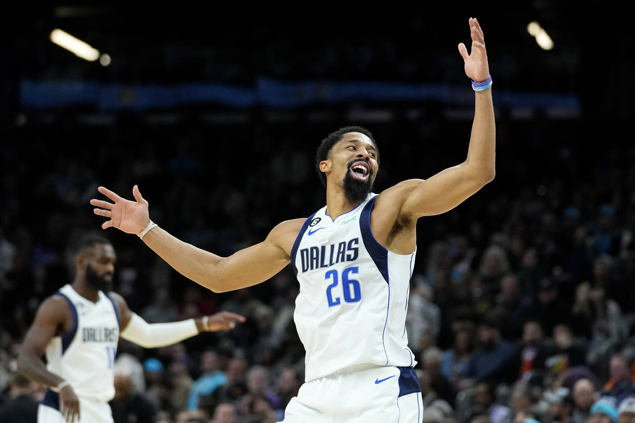 Dallas Mavericks guard Spencer Dinwiddie (26) celebrates a three pointer against the Phoenix Suns d...