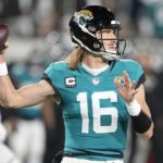 Jags QB Lawrence makes playoff history with 4 1st-half picks