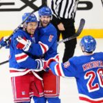Rangers score 3 in 3rd to stop Hurricanes' win streak at 11