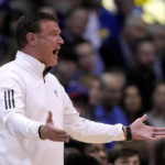 Adams scores late, No. 2 Kansas edges No. 14 Iowa St 62-60
