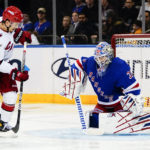 Rangers score 3 in 3rd to stop Hurricanes' win streak at 11