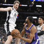 Paul, Bridges help Suns escape Spurs in overtime, 121-116