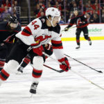 Mercer scores 2, Devils use 2nd period rally to top Canes