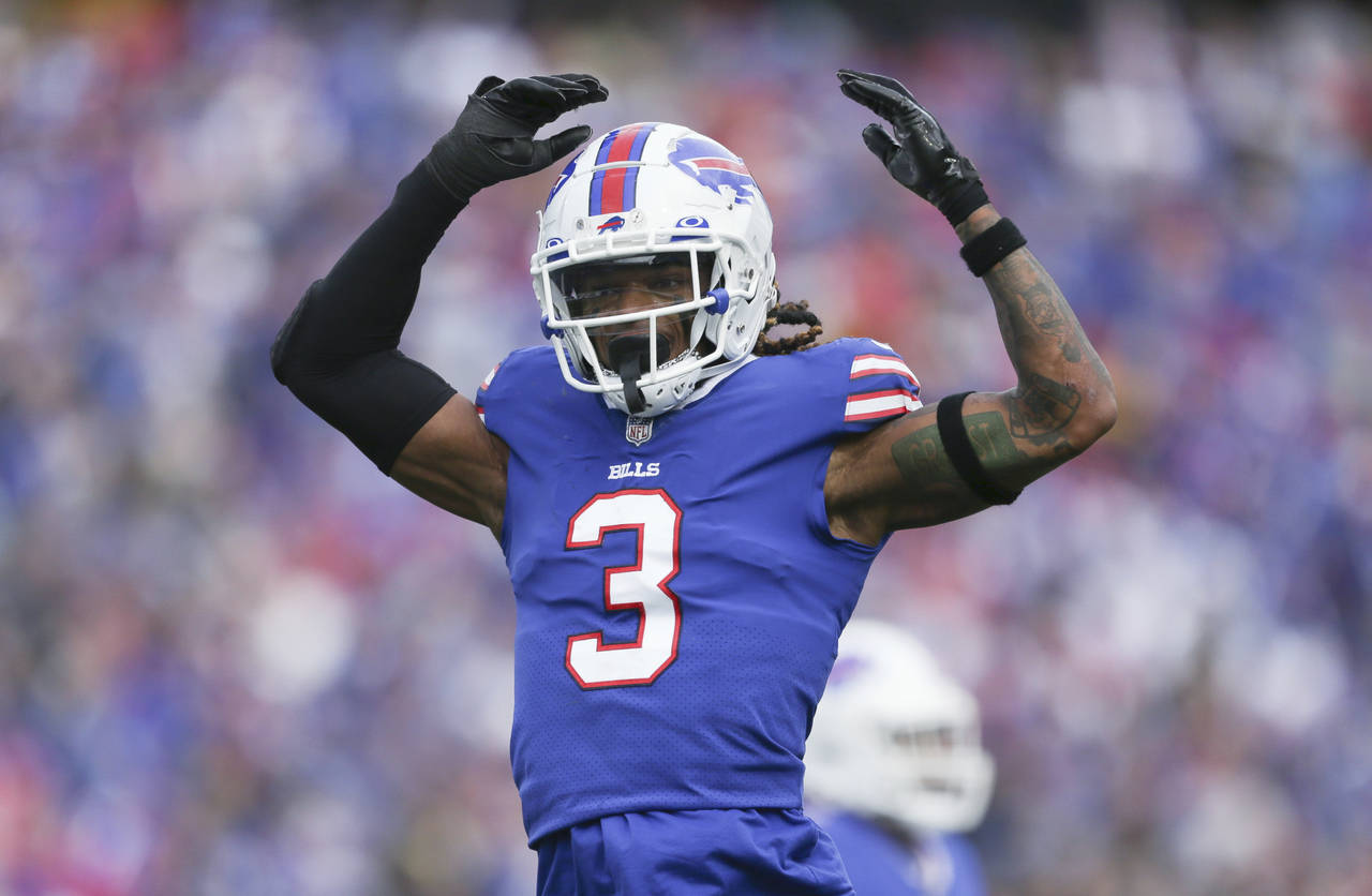 FILE - Buffalo Bills safety Damar Hamlin reacts after a play during the first half of the team's NF...