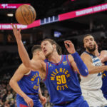 Edwards scores 29, short-handed Wolves beat Nuggets 124-111