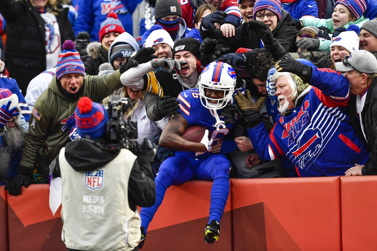 Buffalo Bills wide receiver John Brown (16) celebrates his touchdown during the second half of an N...