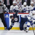 Connor's record 41st winner leads Jets past Lightning 4-2