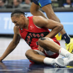 Russell scores 16 points in 4th, Wolves beat Raptors 128-126