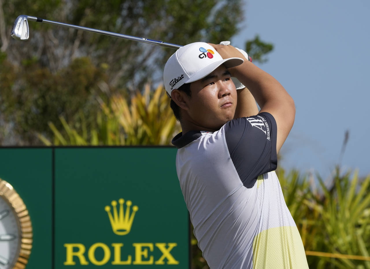 FILE - Tom Kim, of South Korea, watches his shot from the second tee during the second round of the...