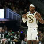 Holiday sparks late rally as Bucks beat Pacers 132-119