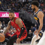 Jokic leads Nuggets past Blazers for 14th straight home win