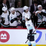 
              Seattle Kraken's Jared McCann (19) celebrates his goal against the Chicago Blackhawks during the first period of an NHL hockey game Saturday, Jan. 14, 2023, in Chicago. (AP Photo/Charles Rex Arbogast)
            