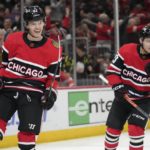 Domi scores in OT to lift Blackhawks over Flames 4-3