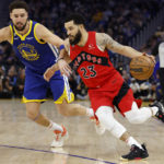 Curry's 35 points send Warriors past Raptors, 129-117