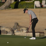 Rahm ties rookie Thompson for AmEx lead at 23 under