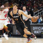 Murray's 28 help hot-shooting Hawks hold off Heat, 121-113