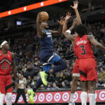 Russell scores 16 points in 4th, Wolves beat Raptors 128-126
