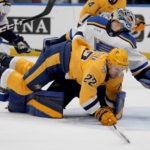Thomas, Saad spark Blues in 5-2 win over Predators