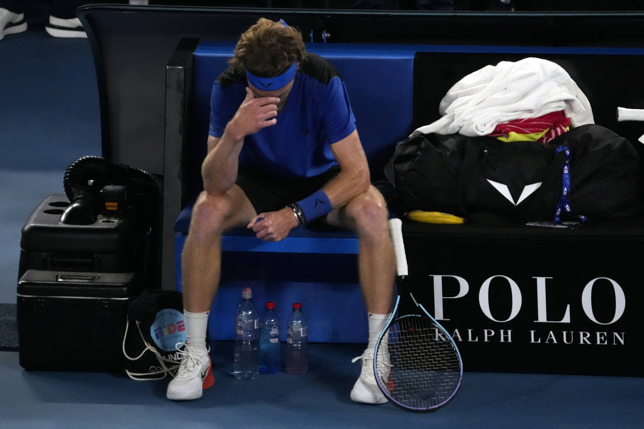 Andrey Rublev of Russia reacts during his quarterfinal against Novak Djokovic of Serbia at the Aust...