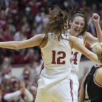Holmes scores 22, No. 4 Indiana women outlast Nebraska in OT