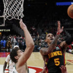 Holiday, Lopez help Bucks hold off Hawks, 114-105