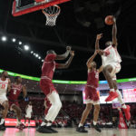Dunn scores 16, Temple defeats No. 1 Houston 56-55