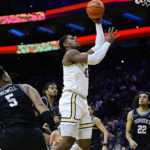 Bynum leads No. 23 Providence past Villanova 70-65