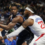 Leonard, George lead Clippers past Mavericks, 112-98