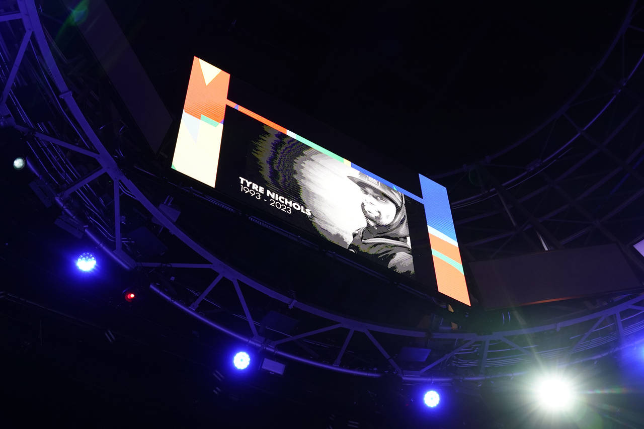 A photo of Tyre Nichols is shown during a moment of silence before an NBA basketball game between t...