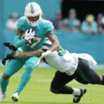 Dolphins clinch playoff berth after beating Jets 11-6