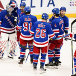 Rangers score 3 in 3rd to stop Hurricanes' win streak at 11