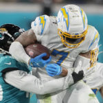 Lawrence rallies Jaguars from 27 down to beat Chargers 31-30